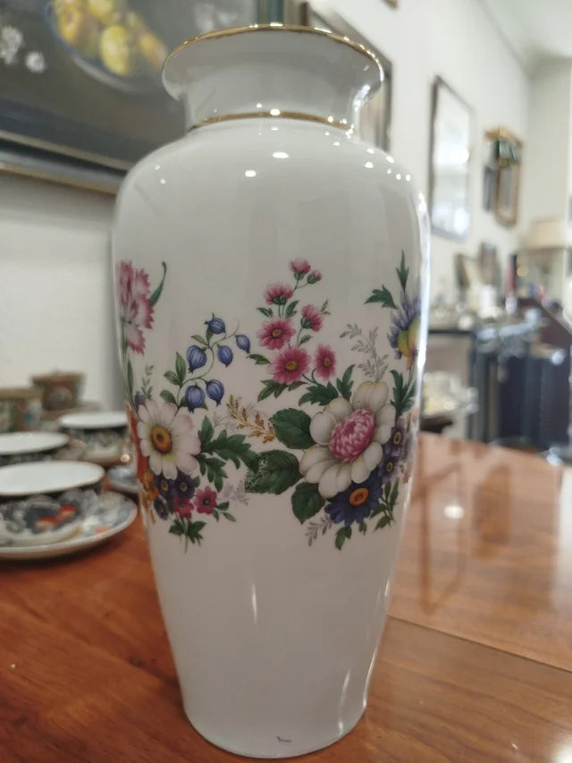 Jarrón de porcelana con flores multicolor