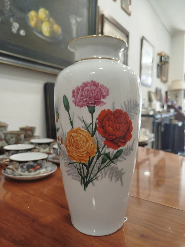 Jarrón de porcelana con flores multicolor